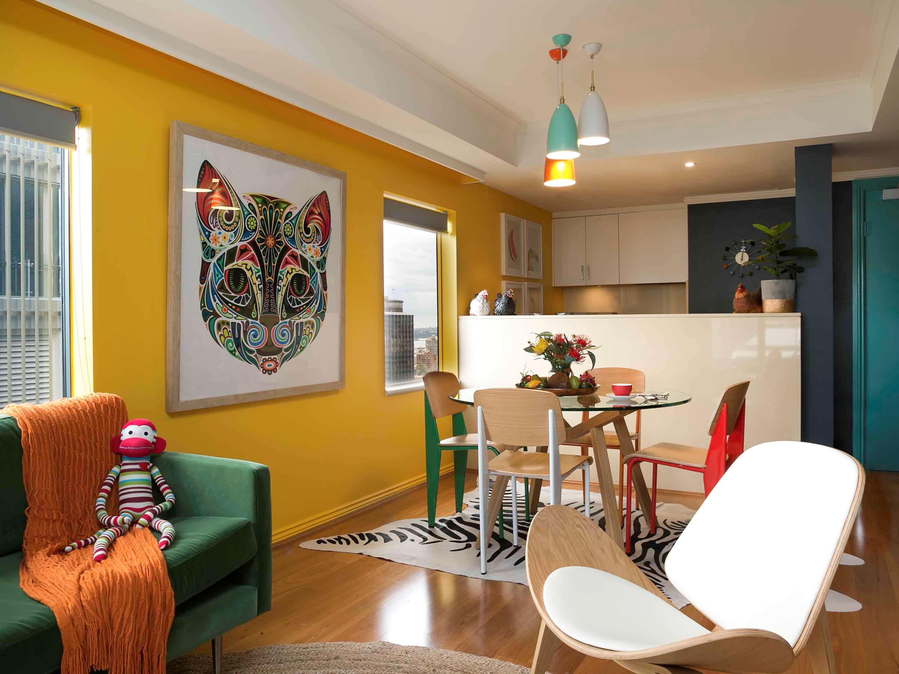Hotel Pullman Sydney Hyde Park Exterior foto A living room with a kitchen in the background